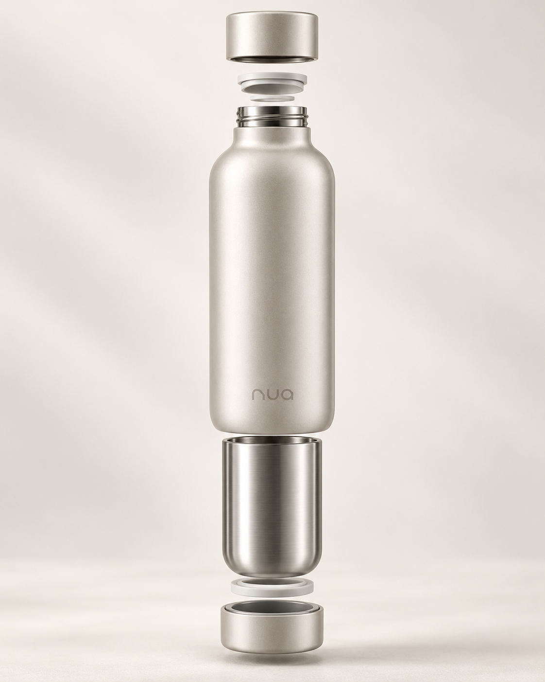 Exploded view of the Nua Bottle showing its cap, seal, outer body and stainless-steel inner wall.